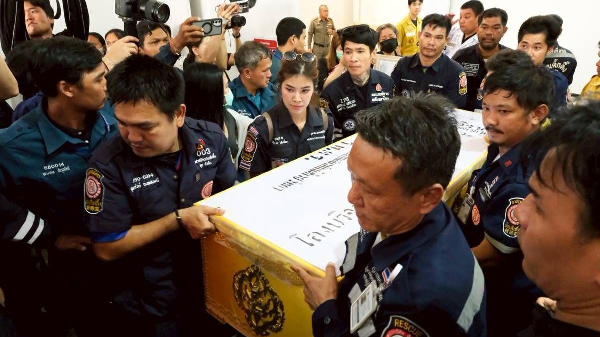 Death toll from Bangkok bar fire rises to 30 as families identify victims