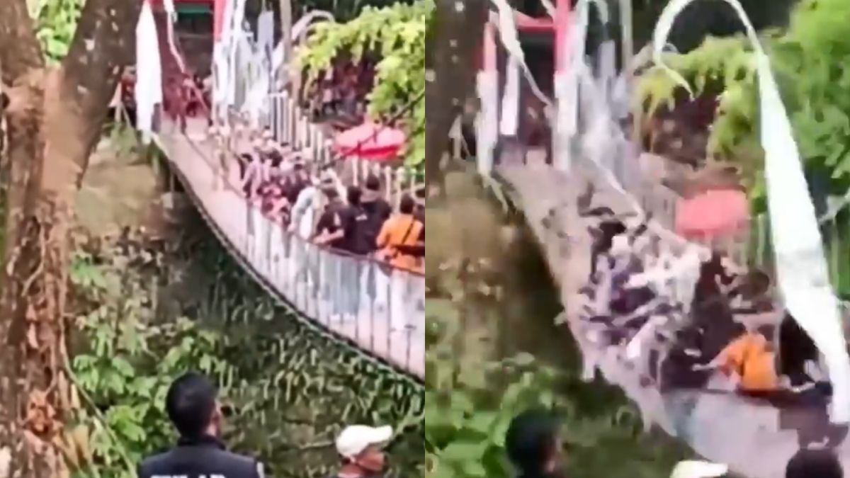 Indonesia suspension bridge tilts during inauguration after more than 50 people cross