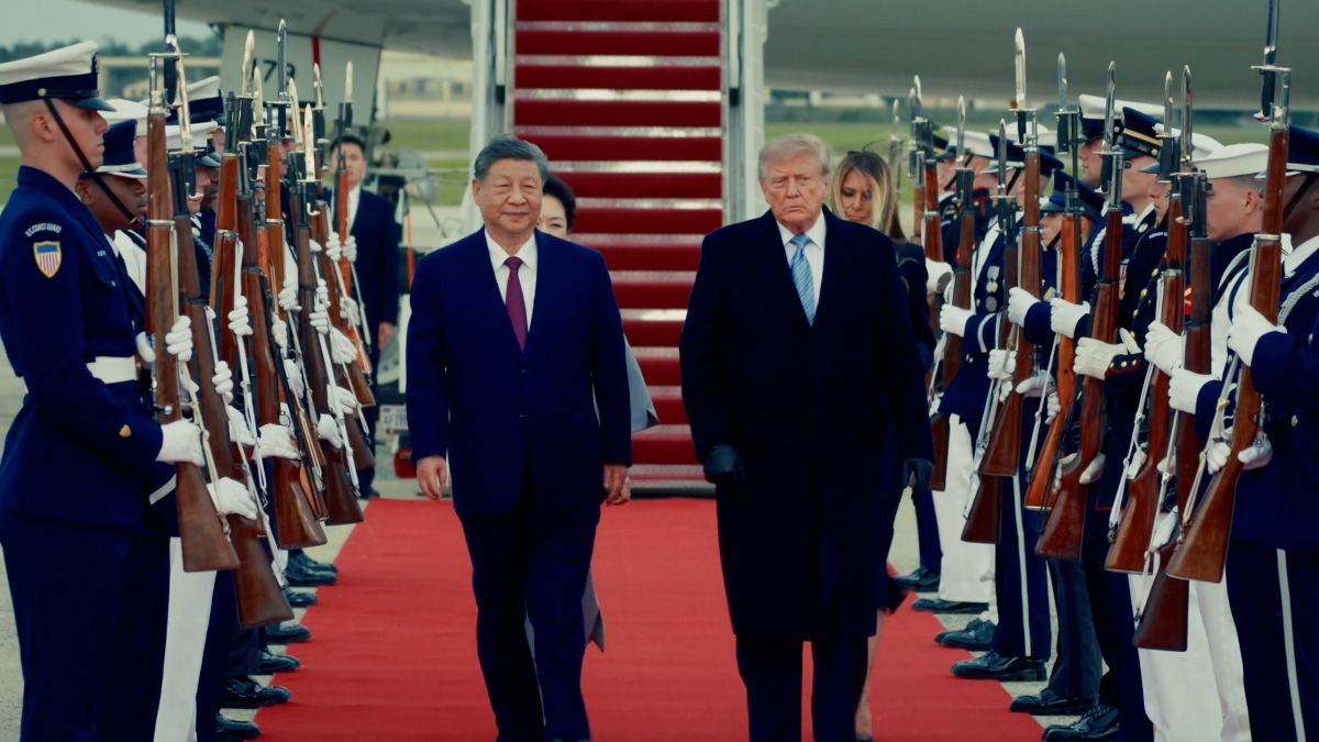 Trump greets Xi on the tarmac as US and China extend trade truce to January