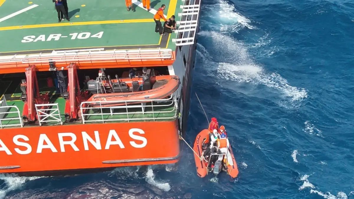 Indonesia identifies 10th body from sunken ferry as search for 125 missing people continues